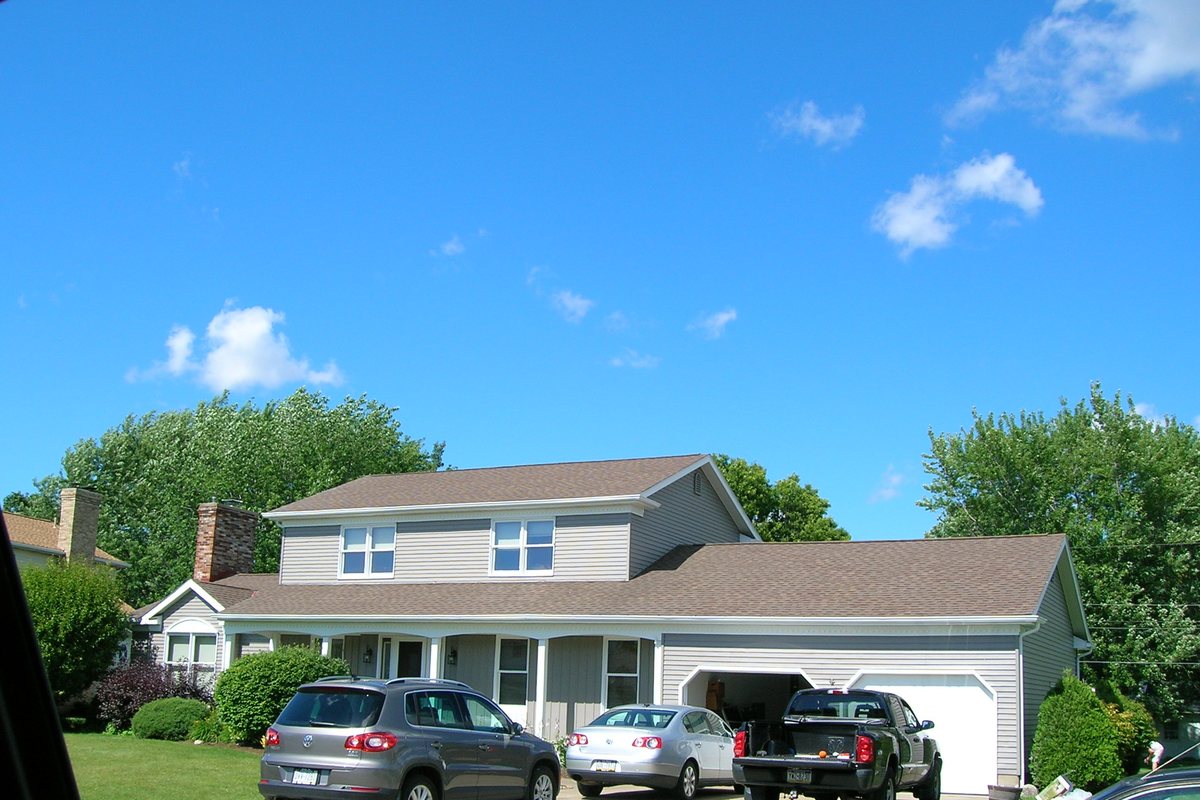 Erie colonial the day after refinishing — fresh, clean finish